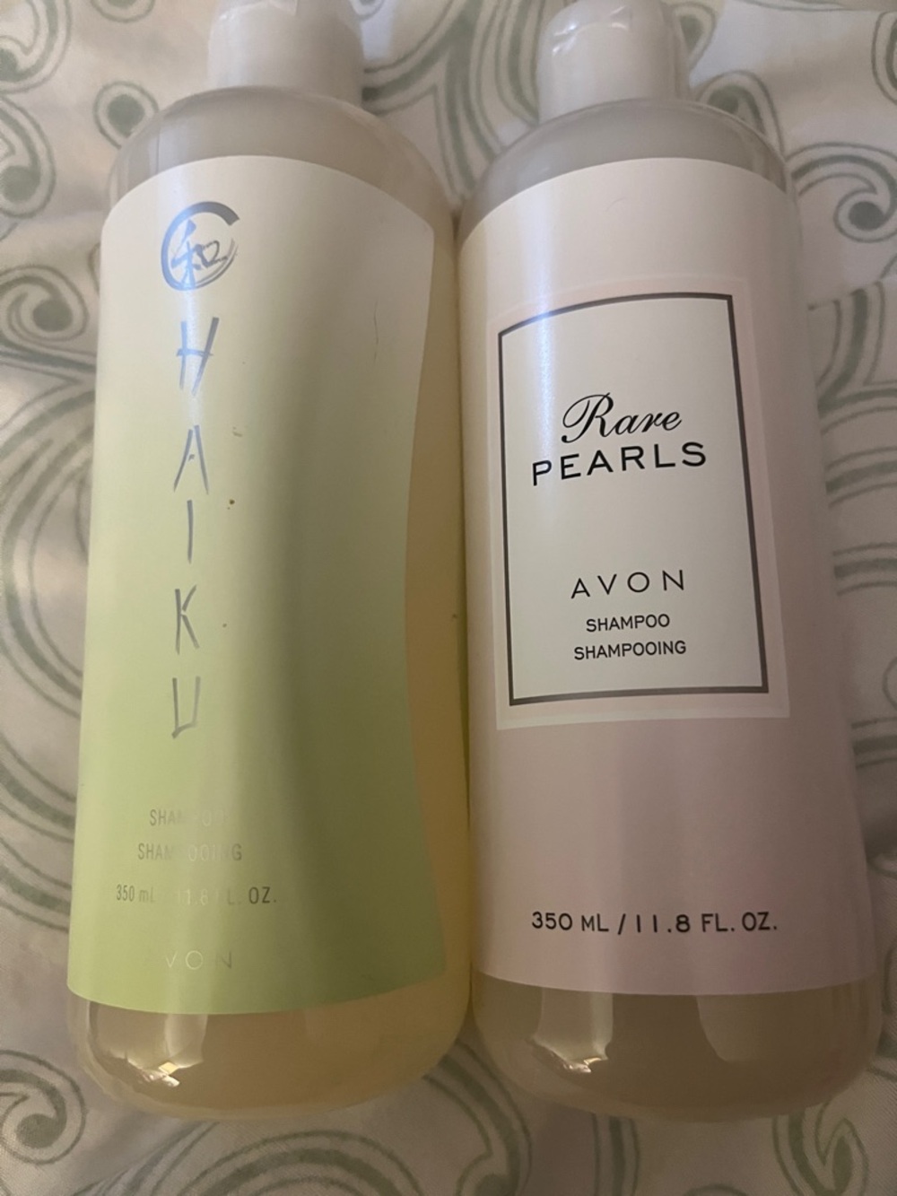 AVON both new , sealed Haiku Light Green & Rare Pearls Pale Pink Shampoo Set